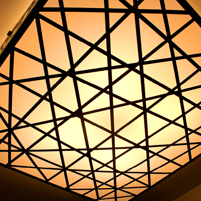 Cross-crossing decorative ceiling fixture