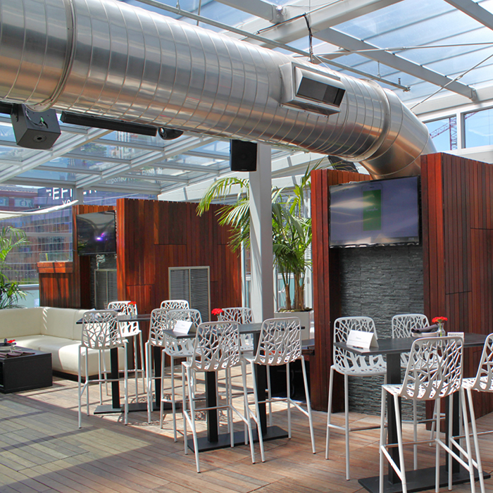 Lounge space with glass ceiling and walls