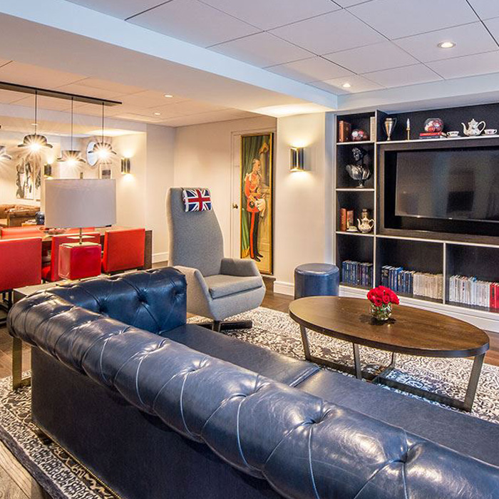 Couch and TV lounge space with a red, white, and blue theme